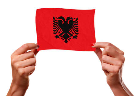 The Albanian flag in the woman handsの写真素材