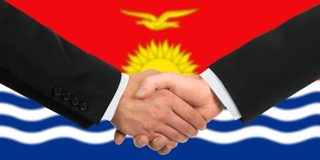 The Kiribati flag and business handshakeの写真素材