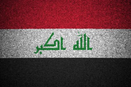 The Iraqi flag painted on a cork board.の写真素材