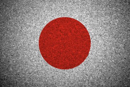 The Japan flag painted on a cork board.の写真素材