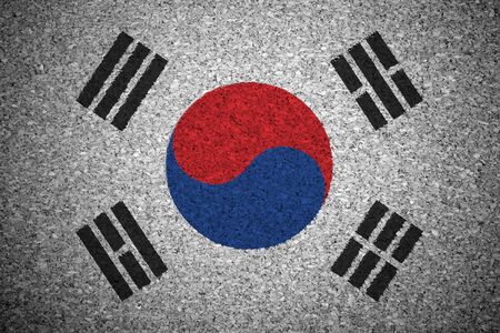 The South Korea flag painted on a cork board.の写真素材