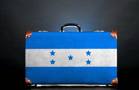 The Honduran flag on a suitcase for travel.の写真素材