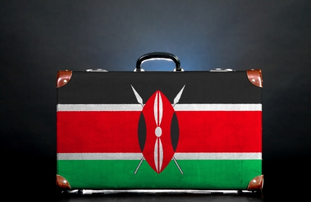The Kenyan flag on a suitcase for travel.の写真素材