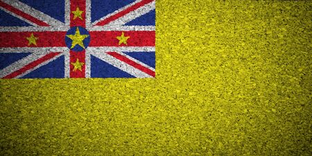 The Niuean flag painted on a cork board.の写真素材