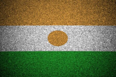 The Niger flag painted on a cork board.の写真素材