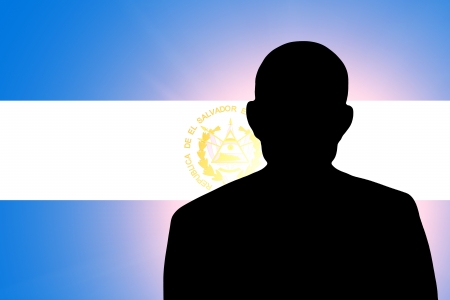 The Salvador flag and the silhouette of an unknown manの写真素材