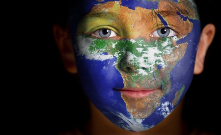 Portrait of a child with a painted Africa  の写真素材