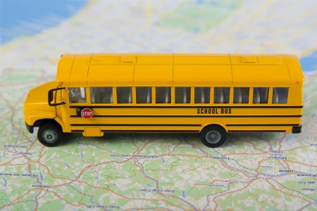 School bus and road map  Closeup, selective focus の写真素材
