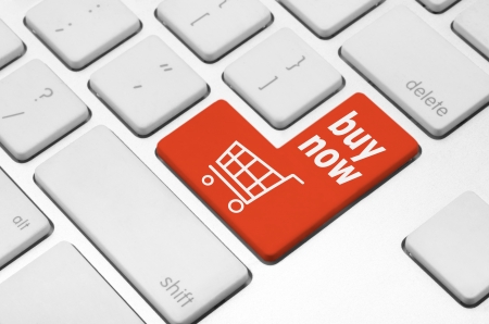 Business finance concept  Shopping cart key on the computer keyboardの写真素材