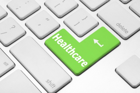 Healthcare concept  Healthcare key on the computer keyboardの写真素材