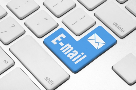 Business concept  E-mail key on the computer keyboardの写真素材