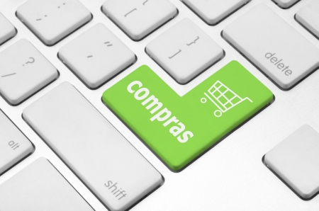 Business finance concept  key  shopping  in Spanish language on the computer keyboardの写真素材