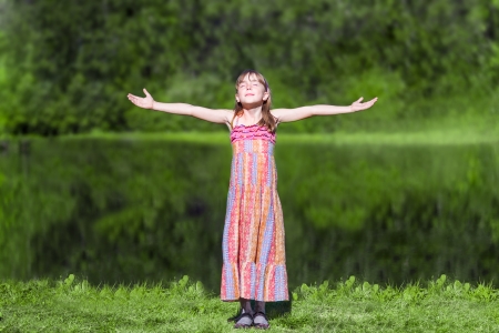 Summer joy - a beautiful girl of lake  Freedom concept の写真素材