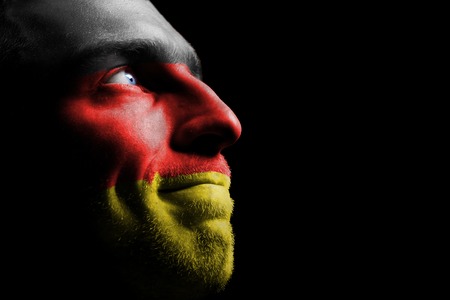 Sports fan from Germany  Isolated on black の写真素材