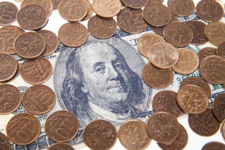 Portrait of Franklin on the hundred dollar bill and russian coins - ten kopeck