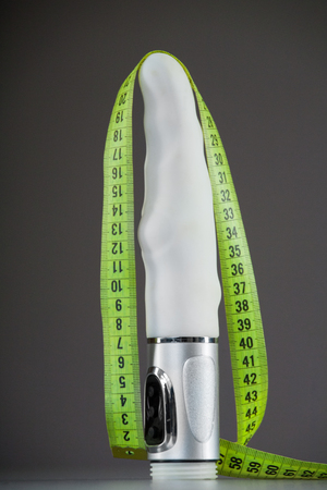 Sex toy and measuring tapeの写真素材