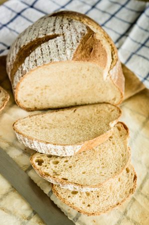 Mixed rye-wheat whole grain homemade sourdough breadの写真素材