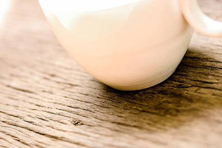 cup of black coffee empty, on the wooden table backgroundの写真素材