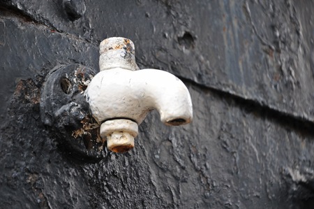 old faucet, tap, water tap on the wallの写真素材