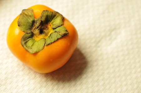 Fresh Persimmon fruit, fruit background, fruit conceptualの写真素材