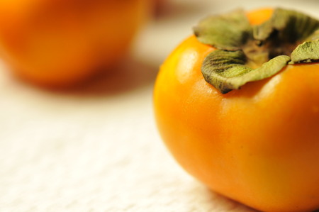 Fresh Persimmon fruit, fruit background, fruit conceptualの写真素材