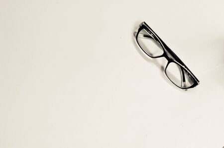 Eyeglass on the tile floor with copy spaceの写真素材