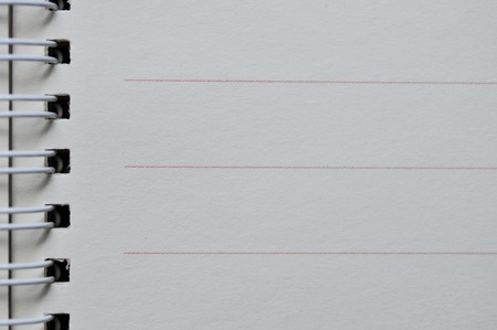 abstract background of close spiral binder on notebookの写真素材