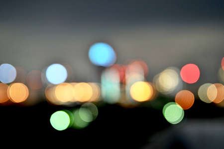 Colorful defocused bokeh lights in blur night background, abstract background of colorful Bokehの写真素材
