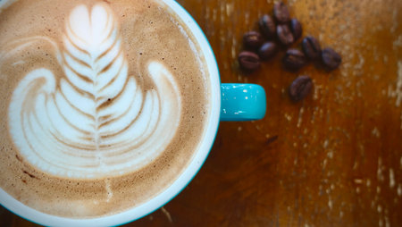Close up of A cup of hot latte art or cappuccino coffee