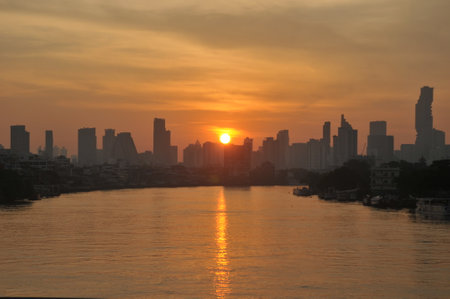 reflection from sun light in the river with beautiful sun setの写真素材