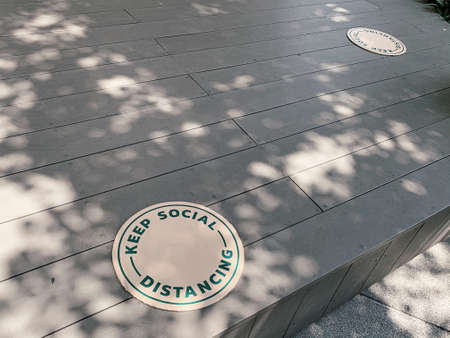 Standing marker for social distancing to avoid spreading coronavirus ( Covid-19 ). Location or distance concept. Idea for COVID-19 outbreak.の写真素材