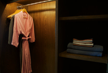 closet with clothes on hanger in the wardrobe at homeの写真素材