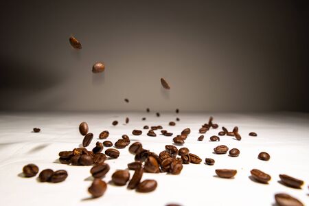 Coffee beans dropped in the airの写真素材
