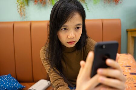 asian women use mobile to Selfieの写真素材
