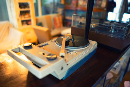 Vintage turntable Retro audio equipment. on Wooden plinth