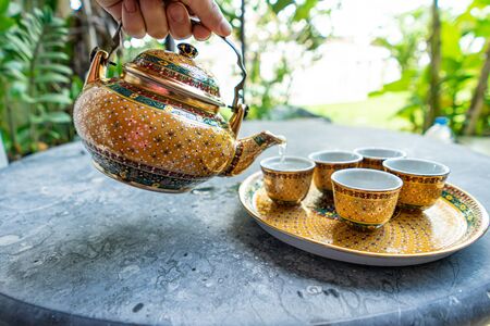 Antique Benjarong porcelain golden tea set, ceramics porcelainの写真素材