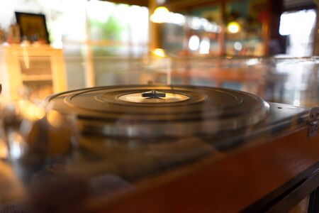 Vintage turntable Retro audio equipment. on Wooden plinthの写真素材