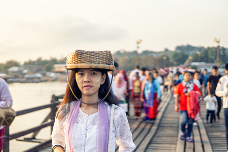 Women dress up asia traditional at Mon Bridge or Uttmanusorn Bridge, Kanchanaburiのeditorial素材