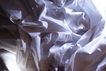 white silk fabric background abstract Smooth and elegant background use with copy space, close-up and wallpaperの写真素材