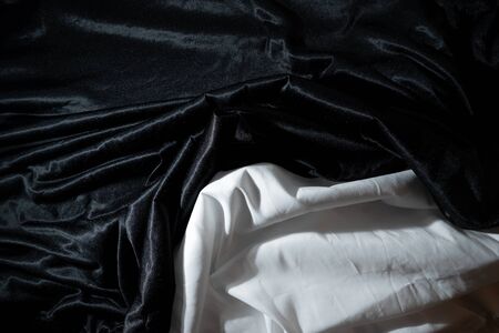 Black and white silk fabric background abstract Smooth and elegant background use with copy space, close-up and wallpaperの写真素材