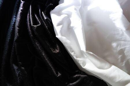 Black and white silk fabric background abstract Smooth and elegant background use with copy space, close-up and wallpaperの写真素材