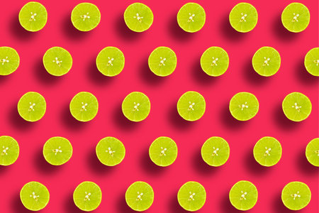 Half lemon pattern flat lay on a vivid red background