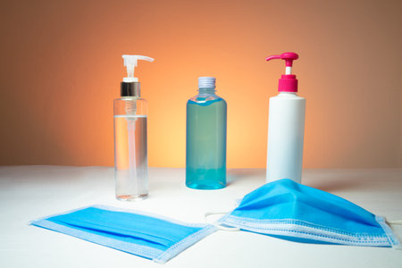 Alcohol gel In the pump bottles Used for sterilize And a mask Used to prevent Covid 19. In the...