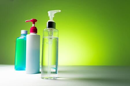 Alcohol gel In the pump bottle Used for sterilize In the green backgroundの写真素材
