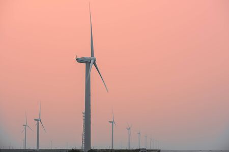Evening coastal wind turbinesのeditorial素材