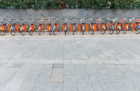 A row of shared bicyclesのeditorial素材