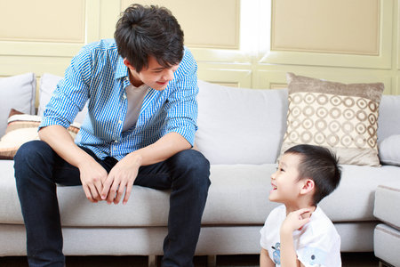 Portrait of young father and sonの写真素材