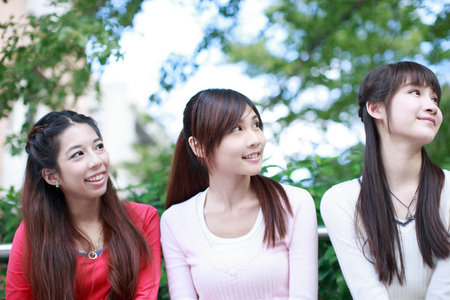 Asian young girls at campusの写真素材