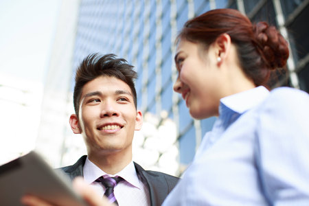 Portrait of young businessman and businesswomanの写真素材