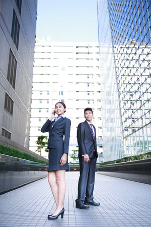 Portrait of young businessman and businesswomanの写真素材